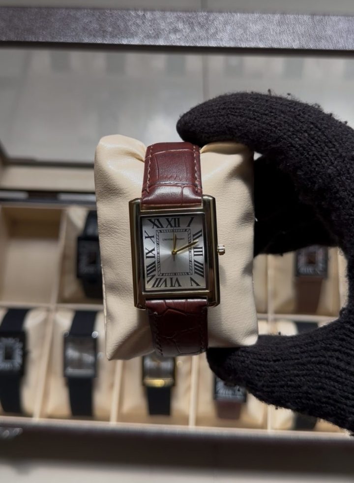Golden dial brown leather belt