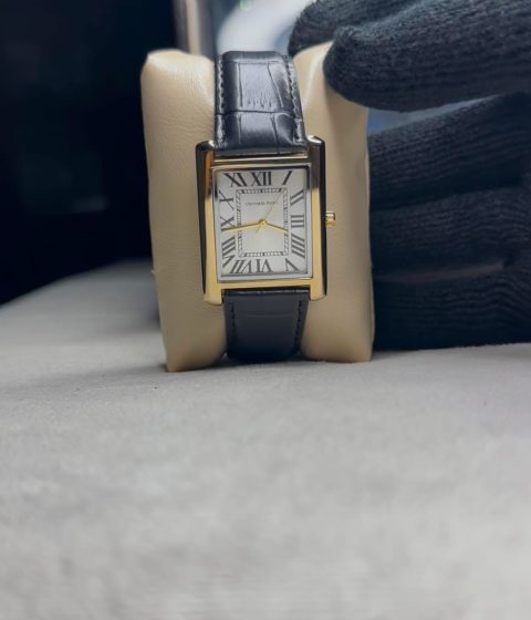 Golden dial black leather belt