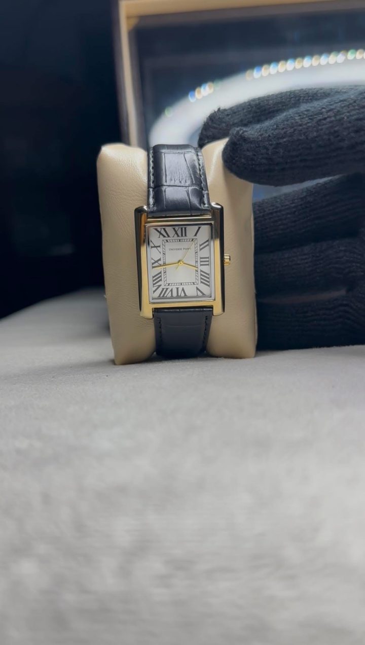 Golden dial black leather belt
