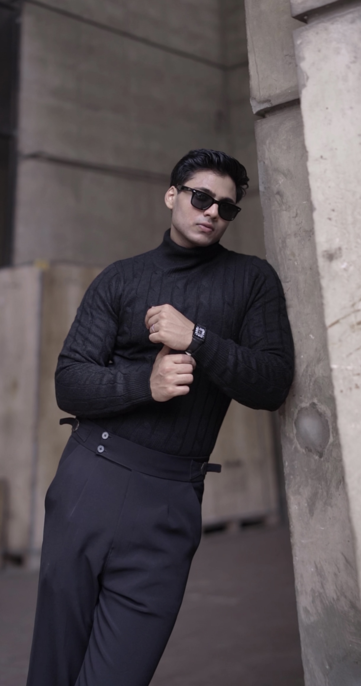 Black cable knit turtleneck sweater